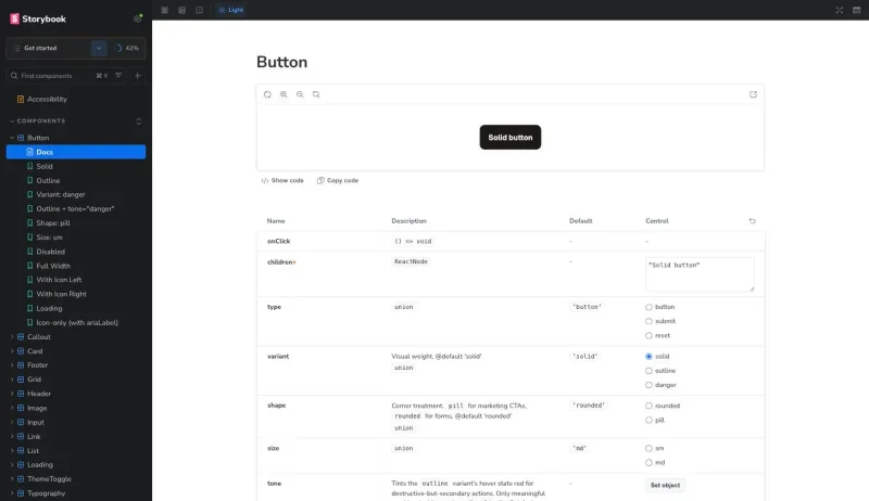 Storybook's sidebar listing every component, with the Button component's docs page open showing its props table and a live example